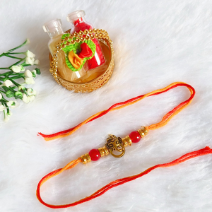 Ganesh Charm Red Beads Rakhi